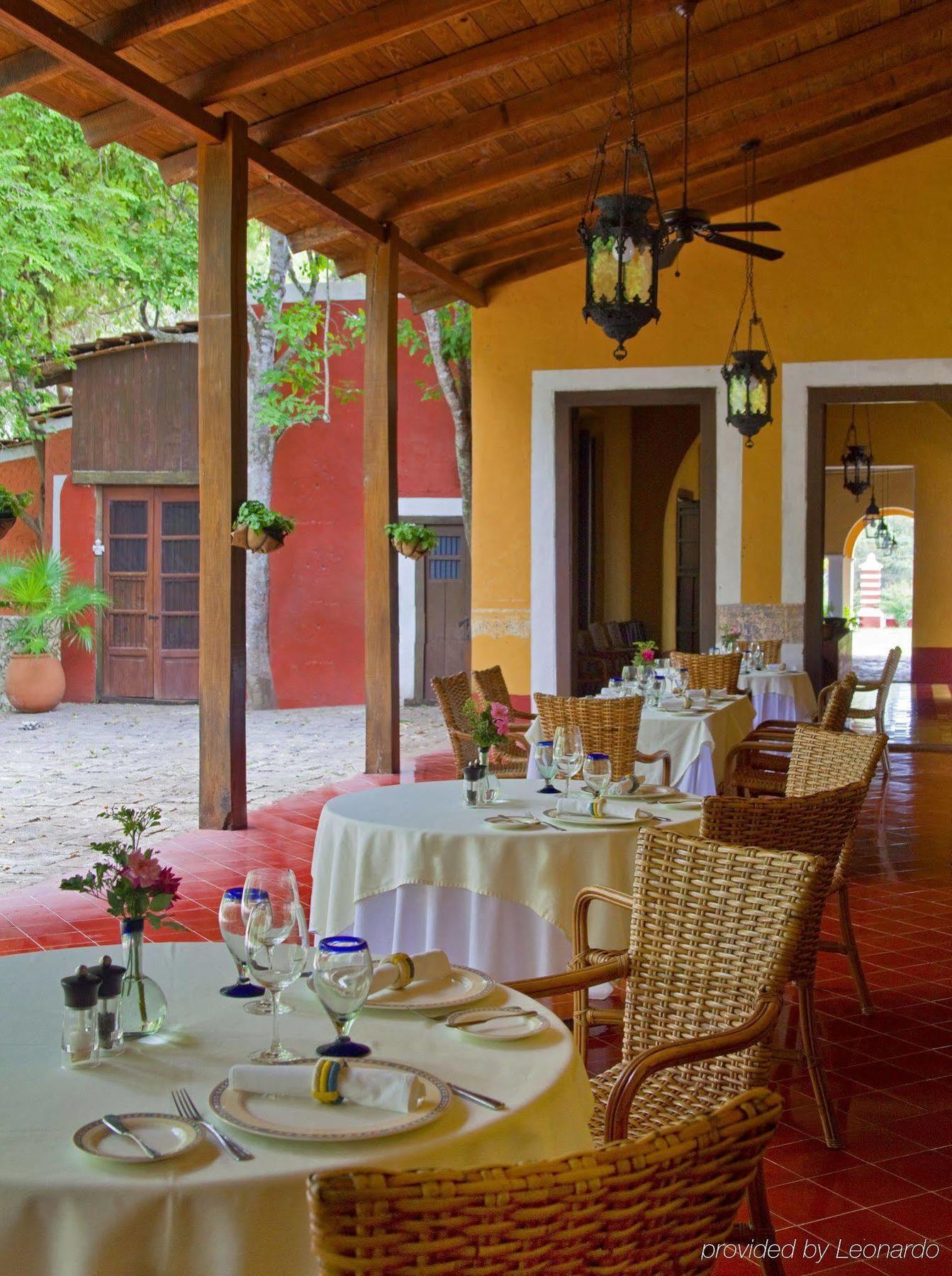 Готель Hacienda Santa Rosa De Lima Ресторан фото